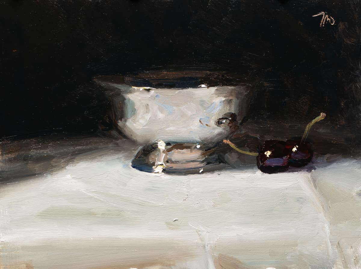 Silver bowl and cherries
